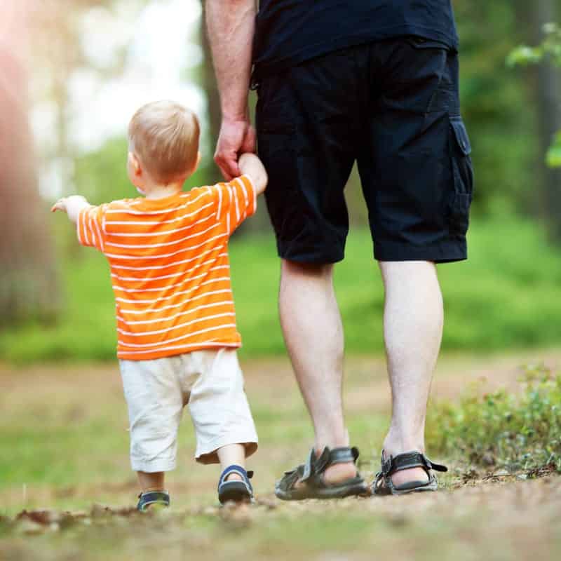 Man walking with his son